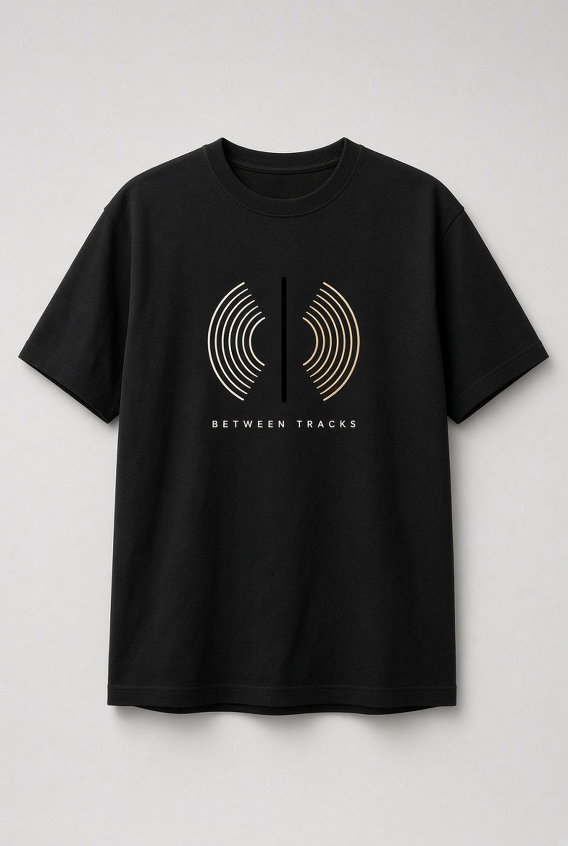 Between Tracks Vinyl Groove Unisex T-Shirt in black with cream-to-gold vinyl groove lines