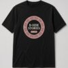 B-Side Stories Vinyl Record Unisex T-Shirt in black with dusty-rose vinyl record label badge