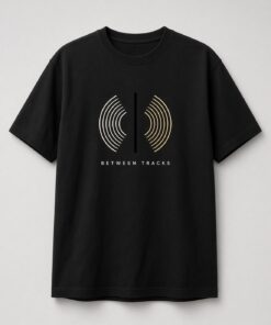 Popscene House Between Tracks Vinyl Groove Unisex T-Shirt in black with cream-to-gold vinyl groove lines split by a vertical line with BETWEEN TRACKS text